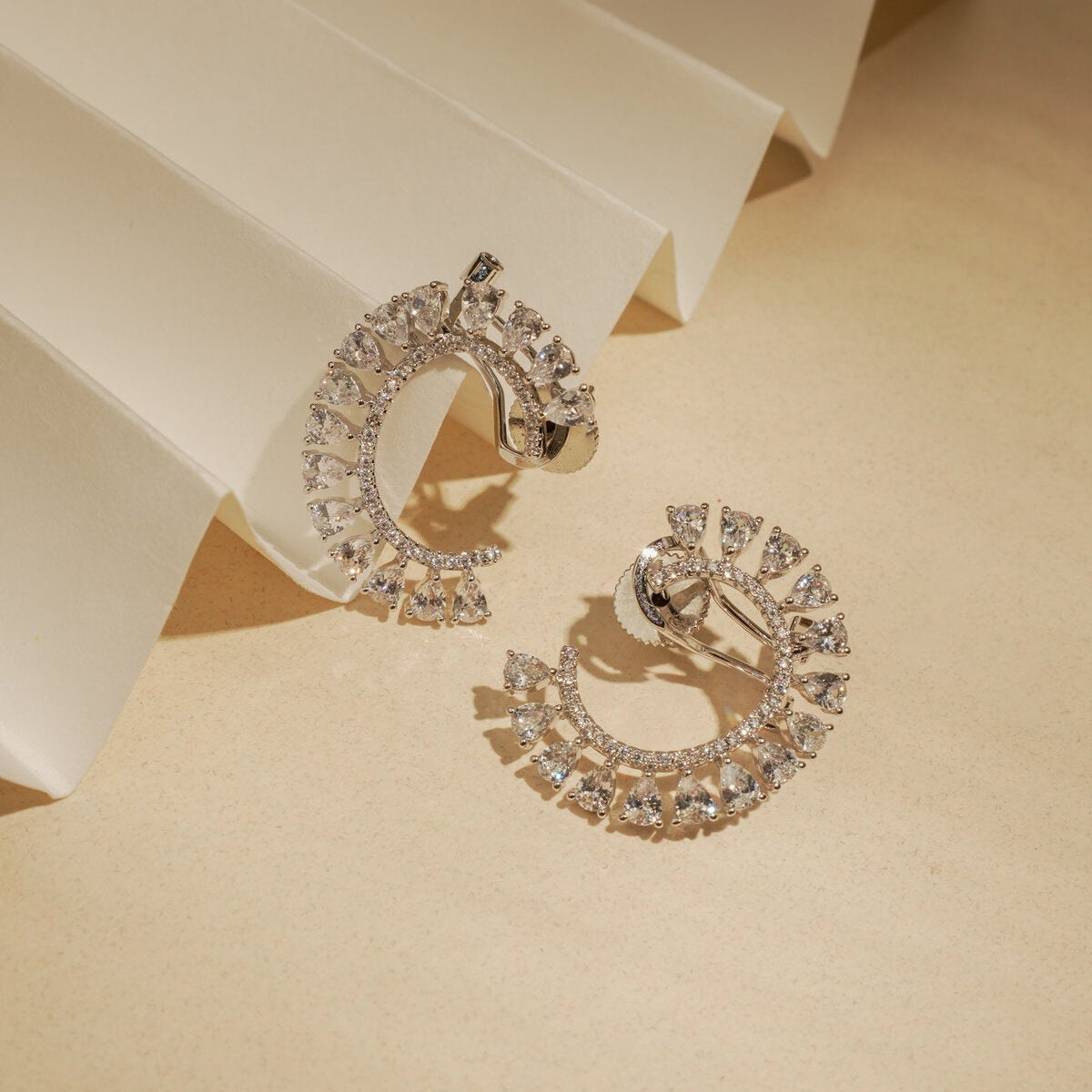 C SHAPED DIAMOND STUDS